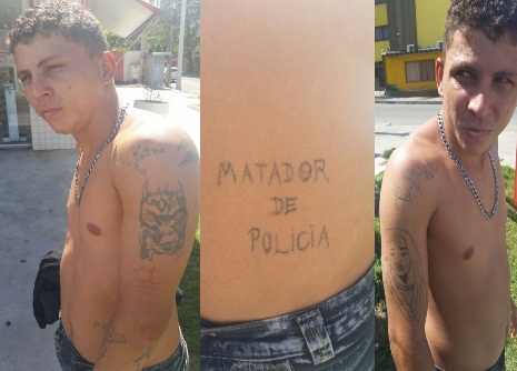 Homem_preso_com_tatuagem_matador_de_Polícia_foto_Marcelo_Castro_mosaico