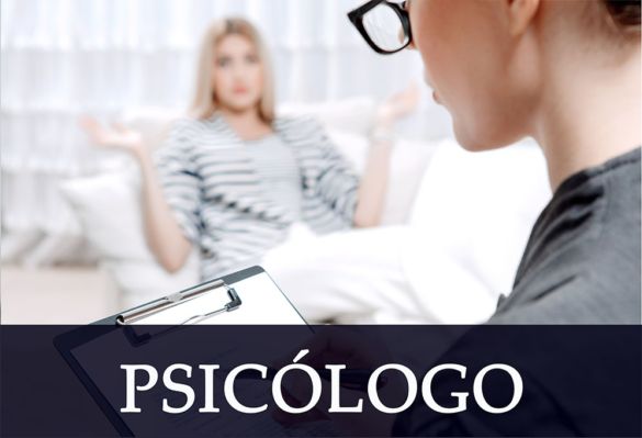 Confident doctor posing and smiling at camera and medical staff checking medical records on background